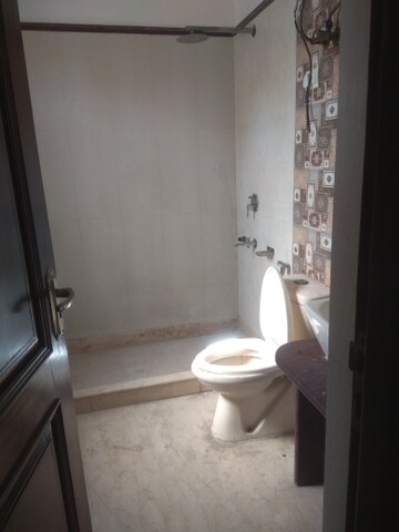 Bathroom in 4 BHK Builder Floor at New Friends Colony – for Rent