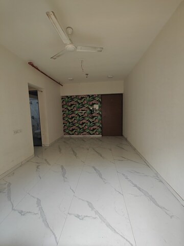 Living Room in 1 BHK Apartment at JK Iris, Mira Road – for Sale