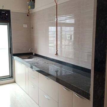 Kitchen in 1.5 BHK Apartment at Runwal Forests, Dockyard Colony – for Rent