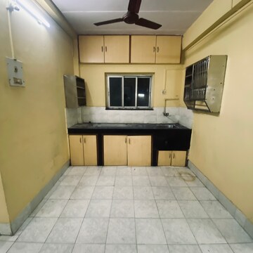 Kitchen in 2 BHK Apartment at Golden CHS, Sion East – for Rent
