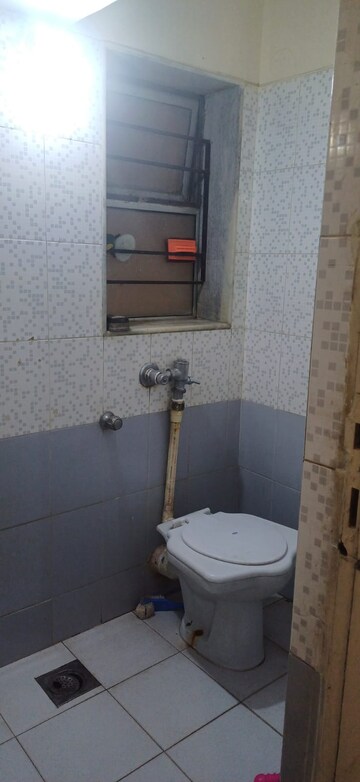 Bathroom in 2 BHK Apartment at Vasant Sagar, Kandivali East – for Rent
