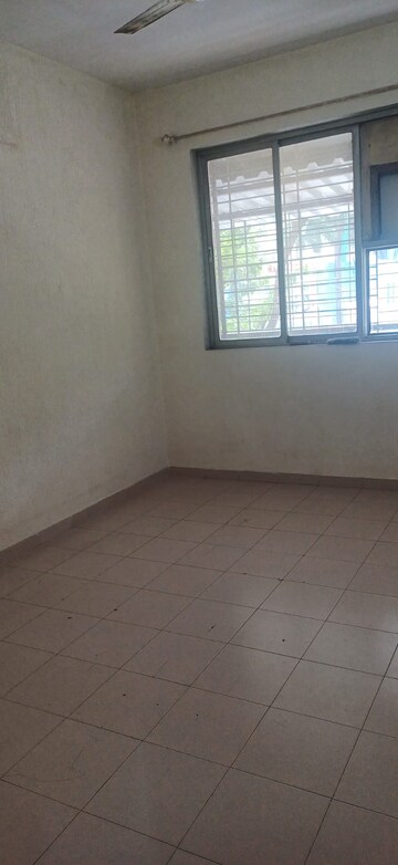 Room in 2 BHK Apartment at Vasant Sagar, Kandivali East – for Rent