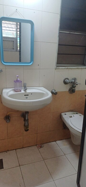 Bathroom in 2 BHK Apartment at Vasant Sagar, Kandivali East – for Rent