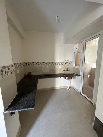 Kitchen in 2 BHK Apartment at Signature Global The Roselia, Sector 95a – for Rent