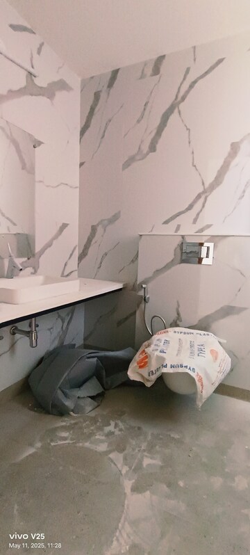 Bathroom in 4 BHK Apartment at Apex The Rio, Ahinsa Khand 2 – for Rent
