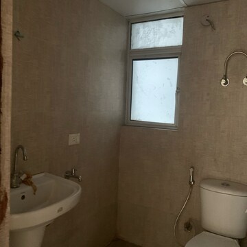 Bathroom in 1 BHK Apartment at Aditya Urban Homes, Shahpur Bamheta – for Rent