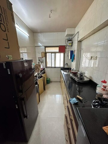 Kitchen in 2 BHK Apartment at Nirmal Lifestyle Residency CHS Ltd, Mulund West – for Rent