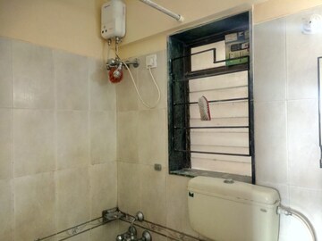 Bathroom in 2 BHK Apartment at Hubtown Akruti Orchid Park, Sakinaka – for Rent