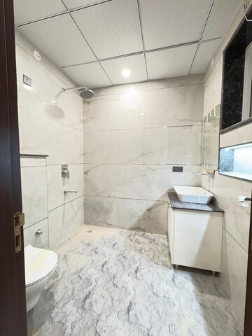 Bathroom in 4 BHK Builder Floor at Ansal Sushant Lok I, Sector 43 – for Rent