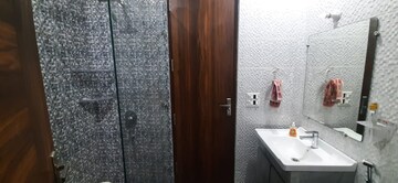 Bathroom in 4 BHK Builder Floor at Ansal Sushant Lok I, Sector 43 – for Rent