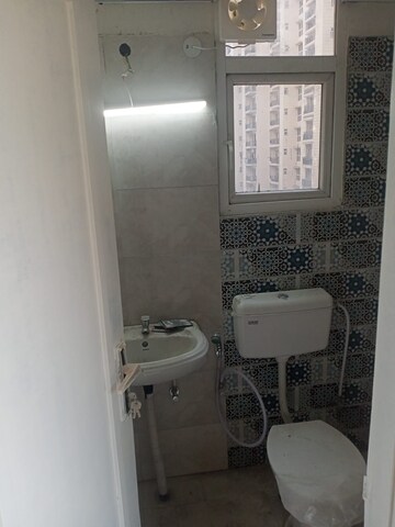 Bathroom in 2 BHK Apartment at Signature Global Proxima, Sector 89 – for Rent