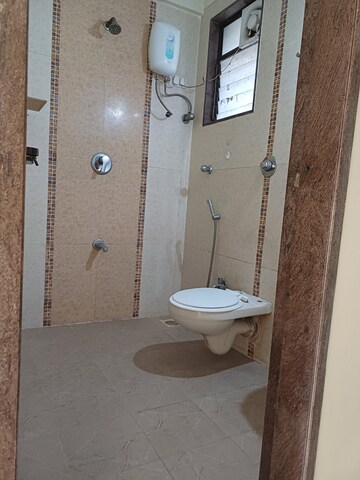 Bathroom in 2 BHK Apartment at Trishul Patel Heights, Ghansoli – for Rent