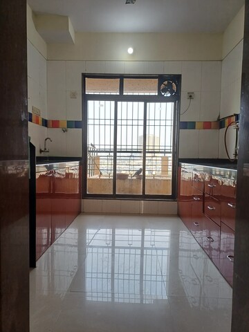 Kitchen in 2 BHK Apartment at Trishul Patel Heights, Ghansoli – for Rent