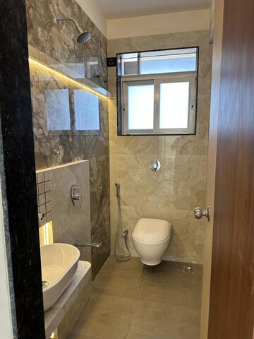 Bathroom in 1 BHK Apartment at Akshar River Gate, Rasayani – for Rent