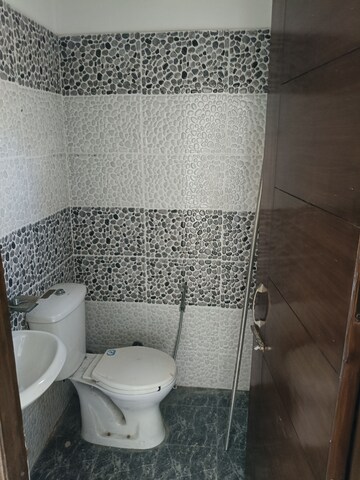 Bathroom in 3 BHK Builder Floor at Guru Nanak Enclave, Dhakoli – for Sale