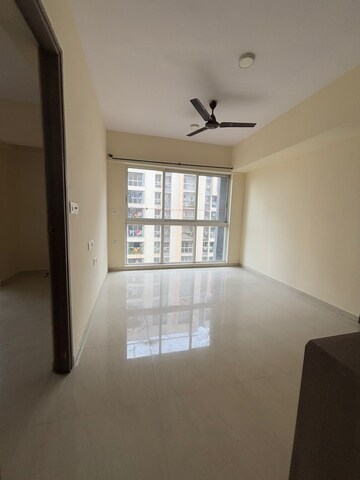 Living Room in 2 BHK Apartment at Lodha Crown Quality Homes, Majiwada – for Rent