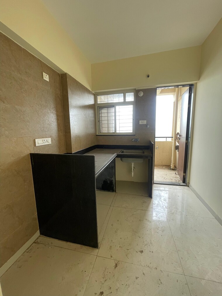 Kitchen, vertical-alcinia 1 Bedroom 620 Sq.Ft. Apartment In Mohammadwadi Pune 8773896
