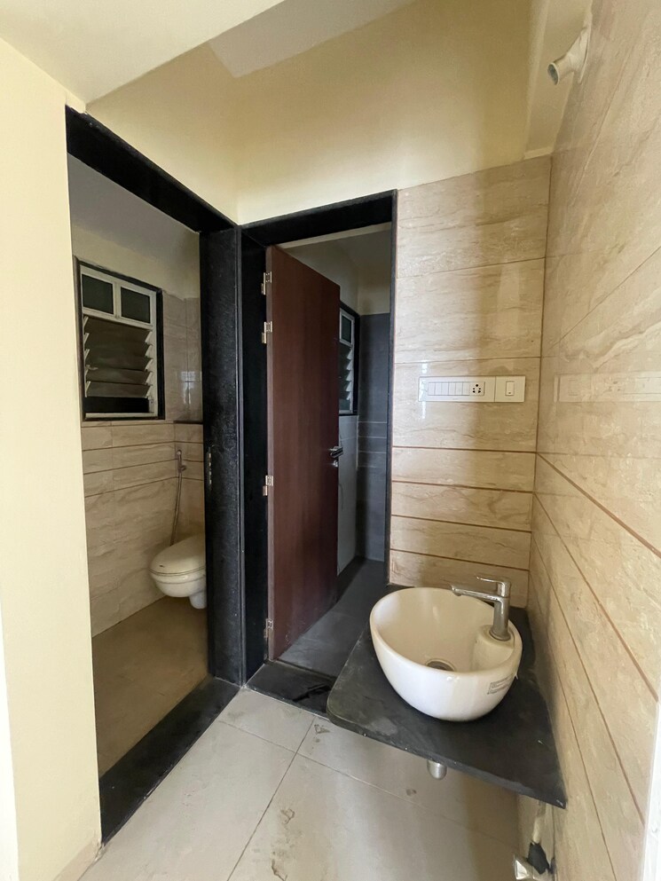 Bathroom, vertical-alcinia 1 Bedroom 620 Sq.Ft. Apartment In Mohammadwadi Pune 8773896