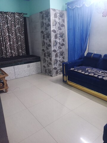 Living Room in 2 BHK Apartment at Shantinagar CHS, Mira Road – for Rent