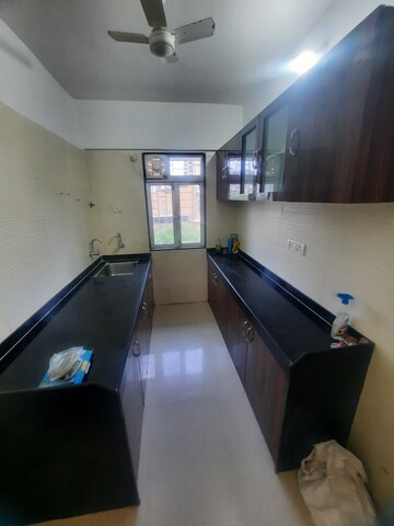 Kitchen in 1 BHK Apartment at Cosmos Residancy, Kavesar – for Rent