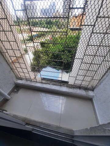 Balcony in 1 BHK Apartment at Cosmos Residancy, Kavesar – for Rent