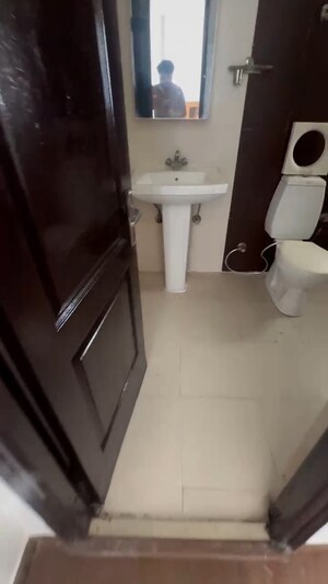 Bathroom in 2 BHK Apartment at Saviour Greenisle, Sain Vihar – for Sale