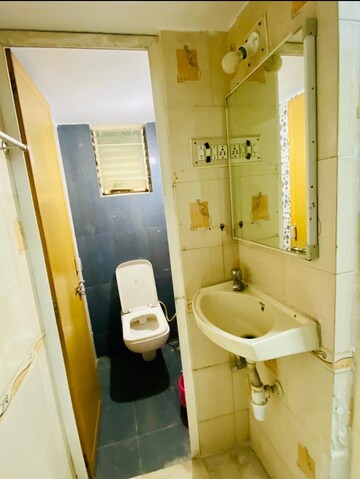 Bathroom in 2 BHK Apartment at Nishtha Devsiddhi Lavish, Navrangpura – for Rent