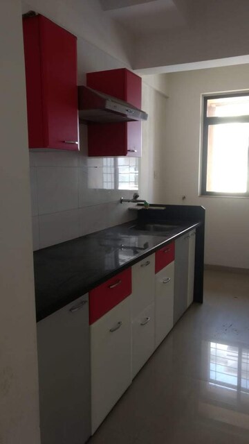 Kitchen in 1 BHK Apartment at Puranik Hometown, Ghodbunder Road – for Sale