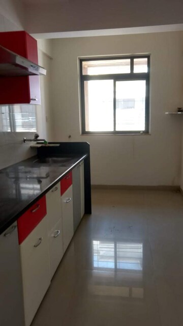 Kitchen in 1 BHK Apartment at Puranik Hometown, Ghodbunder Road – for Sale