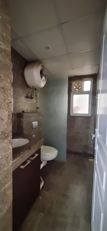 Kitchen in 1 RK Apartment at Mahindra Aura, Sector 110a – for Rent
