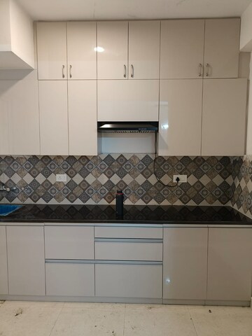 Kitchen in 2 BHK Apartment at Signature Orchard Avenue 2, Sector 93 – for Rent