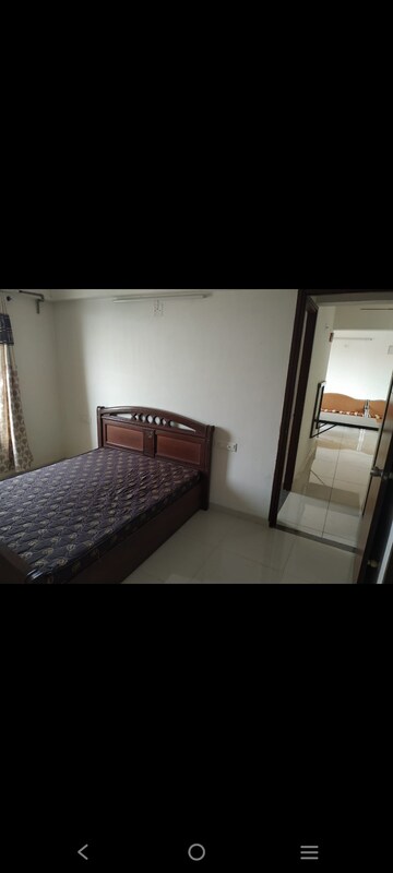 Bedroom in 2 BHK Apartment at Basil Skyline, Tragad – for Rent