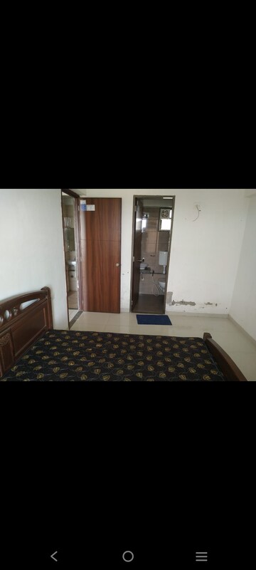 Bedroom in 2 BHK Apartment at Basil Skyline, Tragad – for Rent