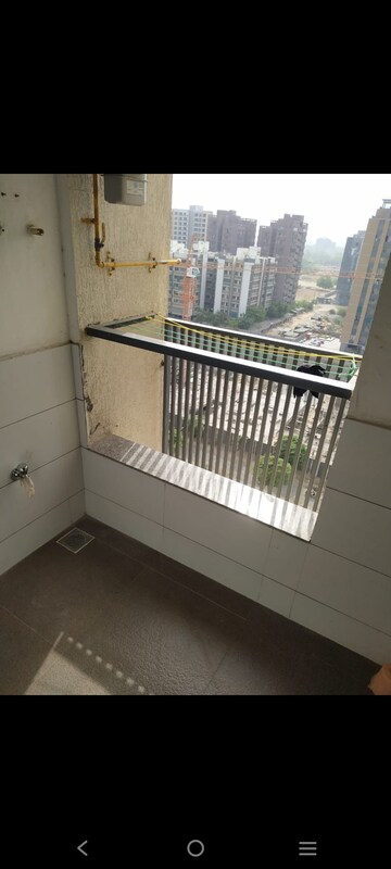 Balcony in 2 BHK Apartment at Basil Skyline, Tragad – for Rent