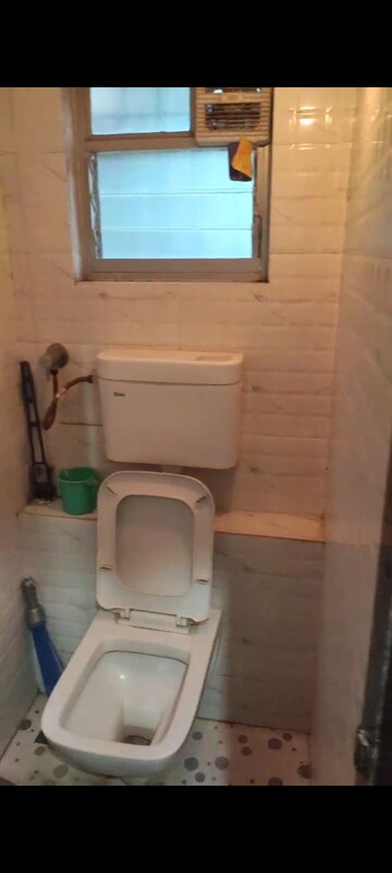 Bathroom in 1 BHK Apartment at Ganga Nagari Nivara CHS, Goregaon East – for Rent