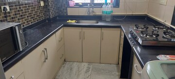 Kitchen in 2 BHK Apartment at Aishwarya Tower, Santacruz East – for Rent