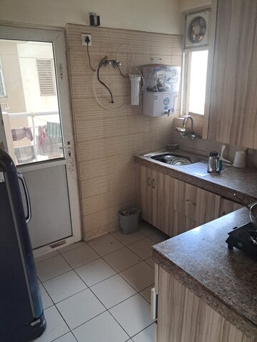 Kitchen in 2 BHK Apartment at 3C Lotus Boulevard, Sector 100 – for Sale