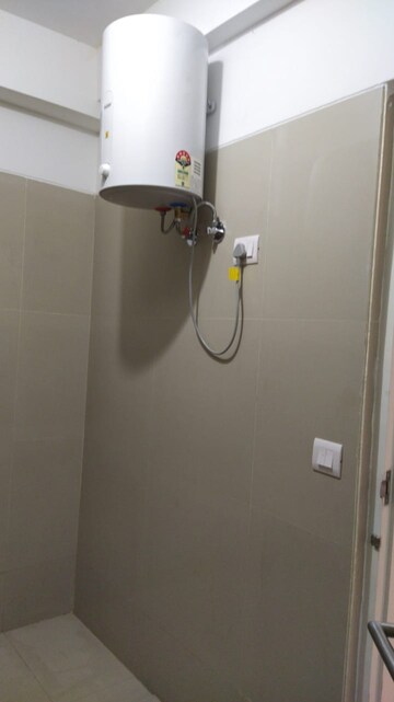 Bathroom in 3 BHK Apartment at Shapoorji Pallonji Joyville Phase 2, Sector 102 – for Rent