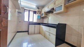 Kitchen in 2 BHK Apartment at Vastu Tower, Malad West – for Rent