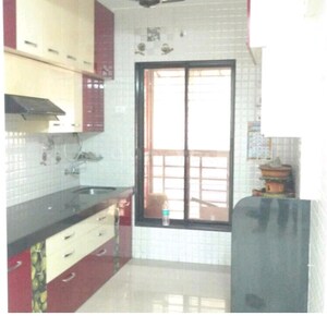 Kitchen in 2 BHK Apartment at Mahavir Kalpavruksha, Ghodbunder Road – for Sale