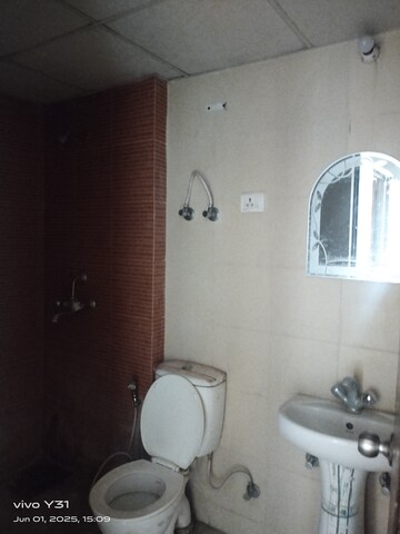 Bathroom in 2.5 BHK Apartment at Mahagun Mywoods, Sector 16c Greater Noida – for Rent
