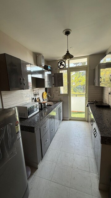 Kitchen in 2 BHK Builder Floor at Sahastradhara Road – for Rent