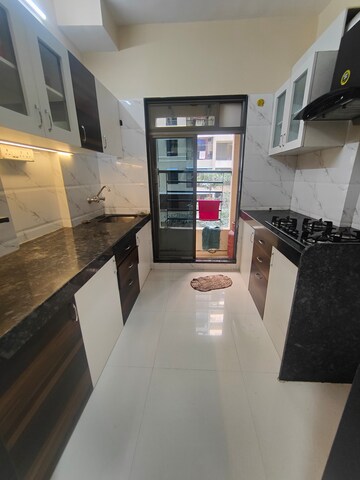 Kitchen in 2 BHK Apartment at Blue Baron Zeal Regency, Virar West – for Sale