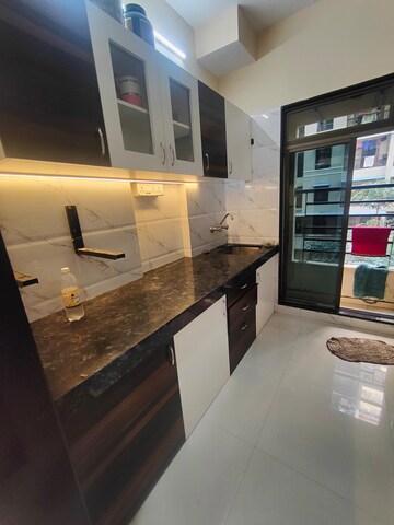 Kitchen in 2 BHK Apartment at Blue Baron Zeal Regency, Virar West – for Sale