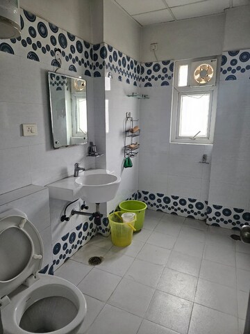 Bathroom in 4 BHK Apartment at Sunshine Helios, Sector 78 – for Rent