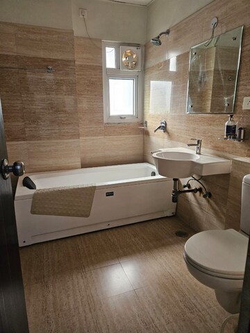 Bathroom in 4 BHK Apartment at Sunshine Helios, Sector 78 – for Rent