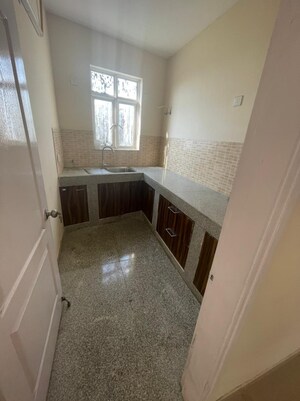 Kitchen in 2 BHK Apartment at Raheja Vedaanta, Sector 108 – for Sale