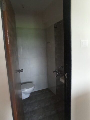 Bathroom in 1 BHK Apartment at KM Horizon Exotica, Haware City – for Rent