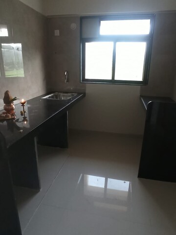 Kitchen in 1 BHK Apartment at KM Horizon Exotica, Haware City – for Rent