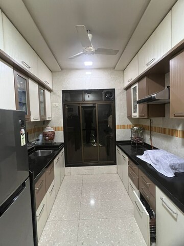 Kitchen in 2 BHK Apartment at Trishul Patel Heights, Ghansoli – for Rent